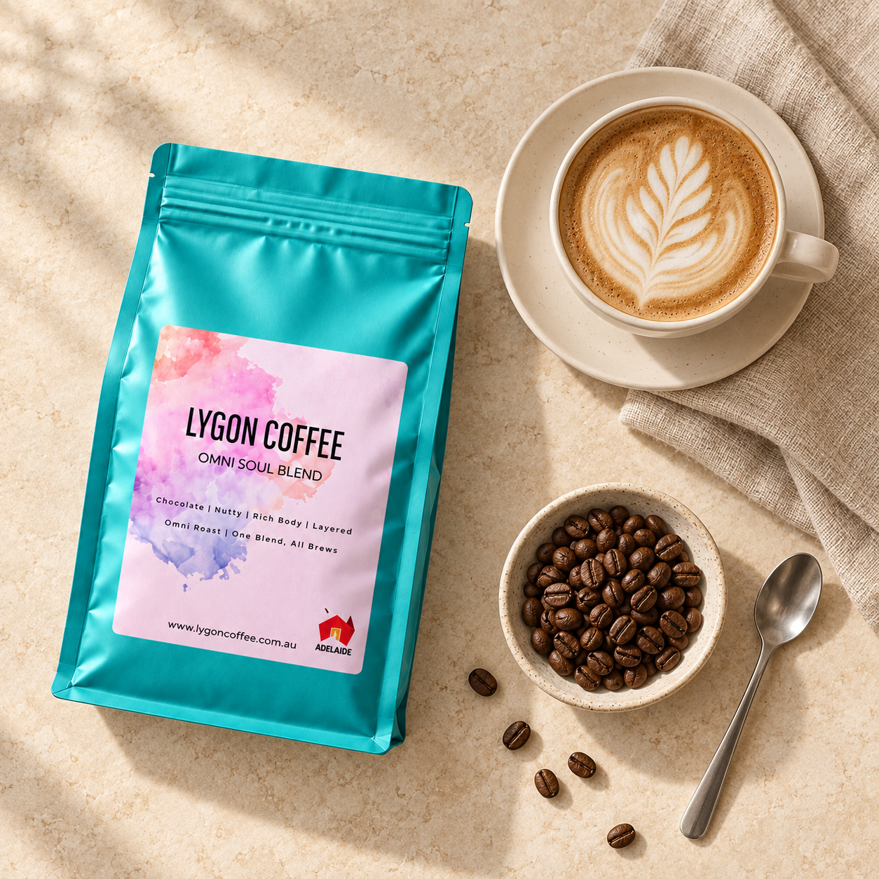 OmniSoul bag beside a latte and coffee beans
