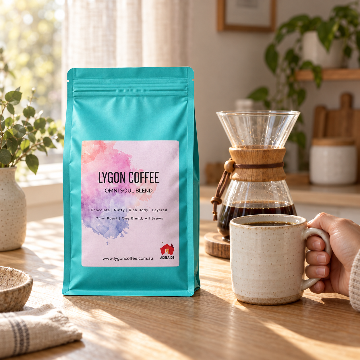 LygonCoffee OmniSoul bag beside a pour-over and a cup of coffee