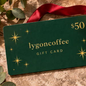 Forest green LygonCoffee $50 gift card with a red ribbon
